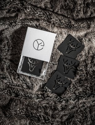 Zoom bild av glasunderlägg present box